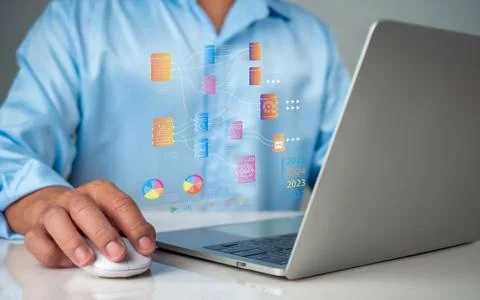 Business people use computers to analyze business and manage corporate data.. Stock Photos