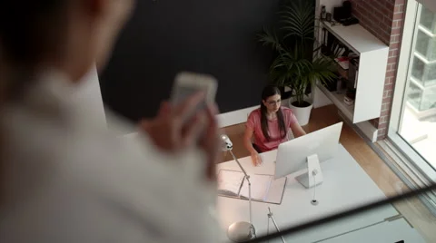 Business people using computer and mobile at office. Stock Footage 64104092