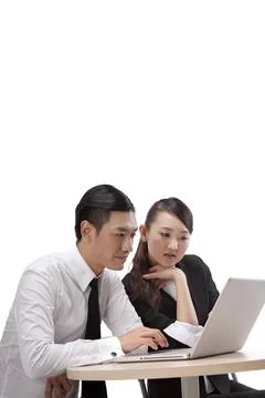 Business people using computer Stock Photos
