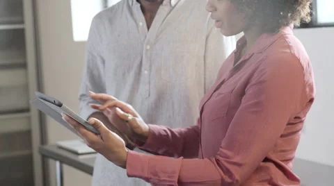 Business people using digital tablet in office Stock Footage 61864879