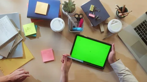 Business people using gadget with chroma green screen top view. Creative workers Stock Footage 166578843