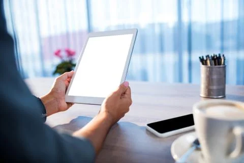 Business people using a tablet computer Stock Photos
