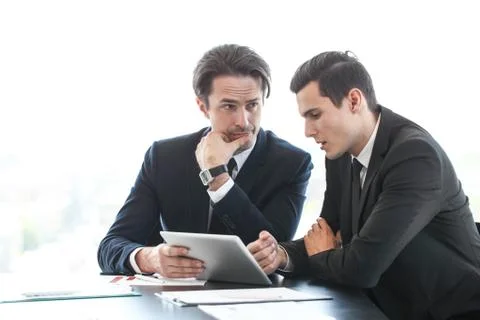 Business people using tablet Stock Photos