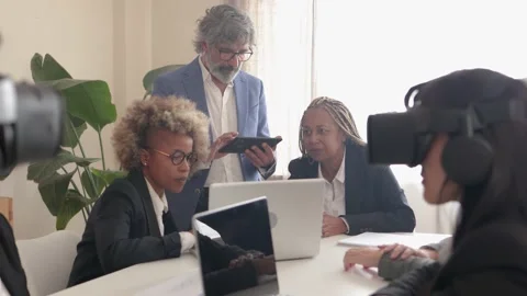 Business people using virtual reality goggles work with metaverse tech - VR new Stock Footage 178590079