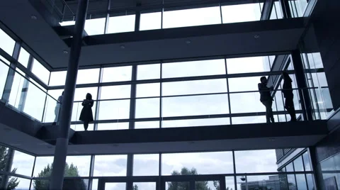 Business people walking in office corridor Stock Footage 59383432