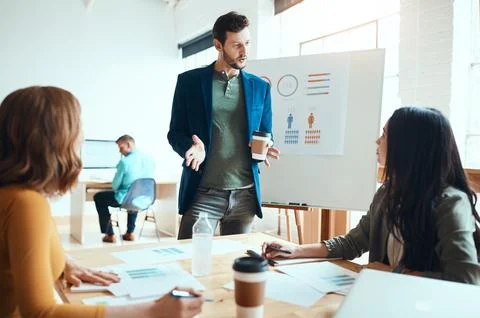 Business people, whiteboard and graphs for discussion, training and agency .. Stock Photos