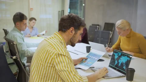 Business people working with data behind glass wall Video stock 132941850