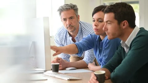 Business people working on desktop computer Stock Footage 62683661