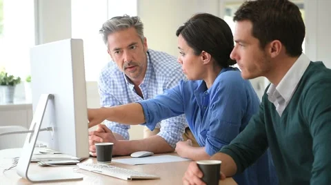 Business people working on desktop computer Stock Footage 62683917