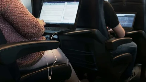 Business people working with notebook on the train Stock Footage 76038112