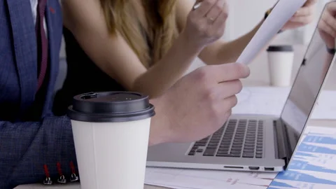 Business people at working process using laptop and documents in company. Stock Footage 85642183