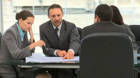 Business people working together on a document Stock Footage 1004201