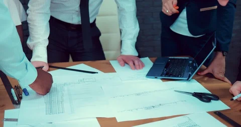 Business people working together on a document during a meeting at the office Stock Footage 89403243