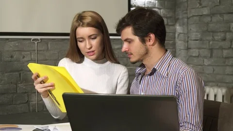 Business people working together using laptop at the office Stock Footage 84775558
