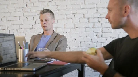 Business peoples in the creative office work with laptops and throw colored Stock Footage 91600509