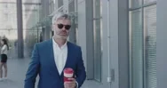 Business Person Holding Coffee To Go Having Break. Lifestyle Concept Stock Footage