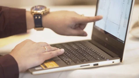 Business person pointing at computer screen Stock Footage 87476071