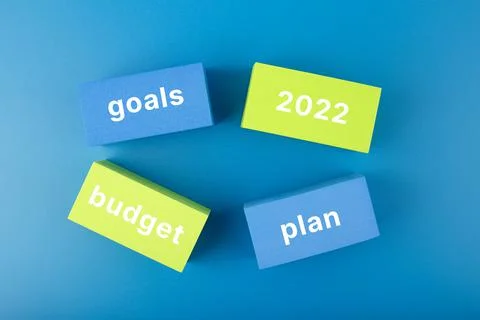 Business plan concept 2022. Text budget, plan, goals 2022 written on colored Stock Photos