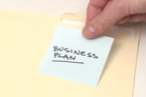 BUSINESS PLAN sticky note - NTSC Video stock 666335