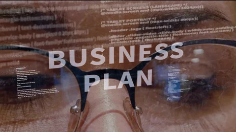Business plan text on background of developer Stock-Footage 105659388