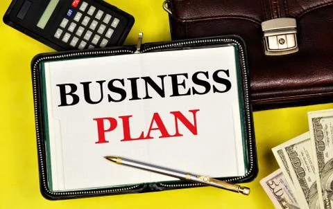 Business plan. The text label in the notebook. Stock Photos