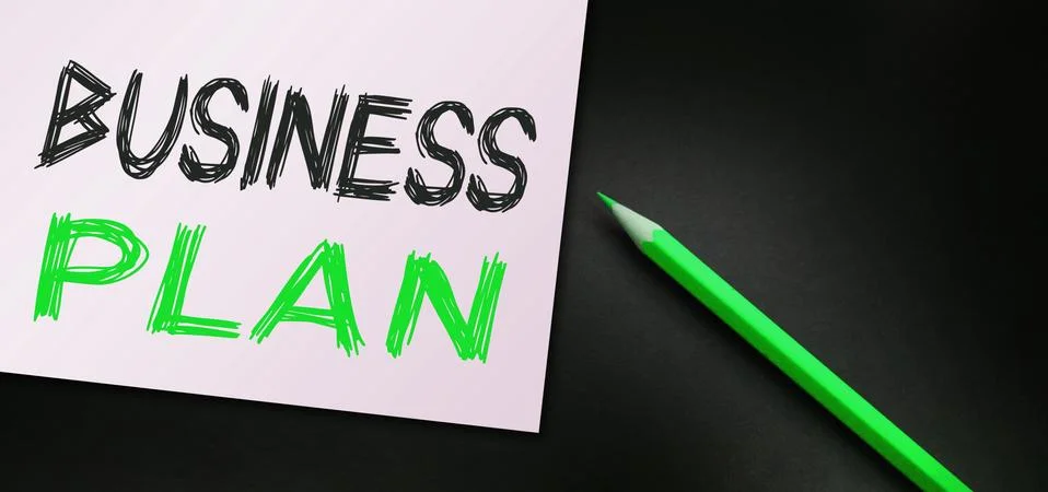 BUSINESS PLAN text written on paper and orange pen. Business concept 库存照片