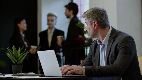 Business planning manager using laptop keyboard in workplace. Successful man Stock Footage 251567243