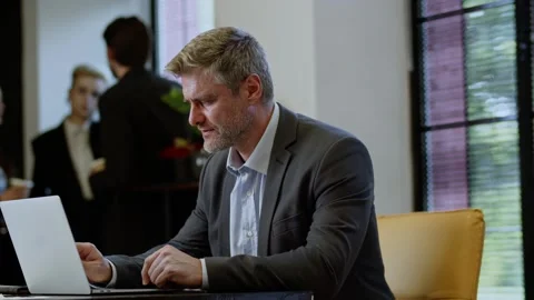 Business planning manager using laptop keyboard in workplace. Successful man Stock Footage 256665372