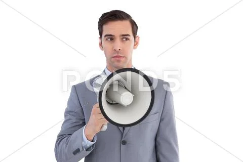 Business preparing himself to shout with a megaphone Stock Photos