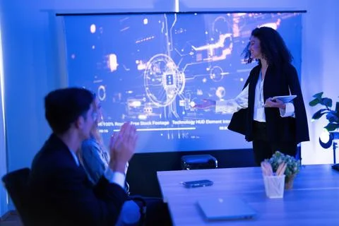 Business presentation showcasing digital technology in a modern office sett.. Stock Photos