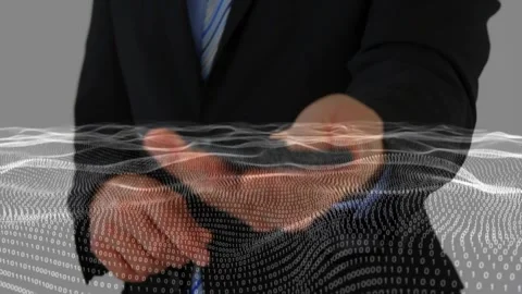 Business presenter tapping and sweeping hands on gray backdrop, showing binary Stock Footage 331197663