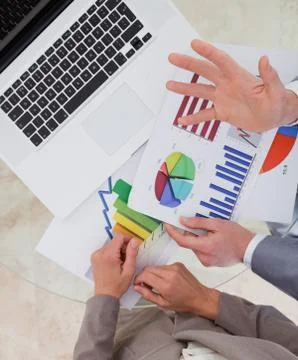 Business process analysts looking at research data Stock Photos