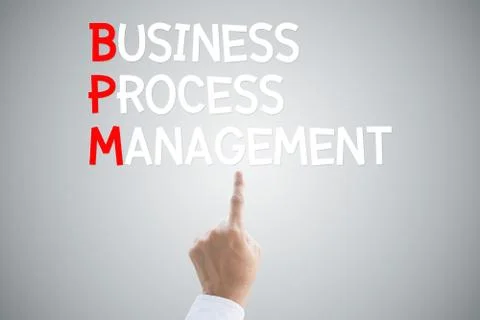 Business process management hand press concept on grey background Illustrazione stock