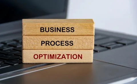 Business Process Optimization text on wooden blocks representing continuous.. Foto stock