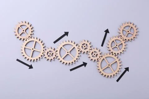 Business process organization and optimization. Scheme with wooden figures .. Stock Photos