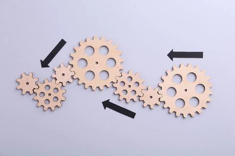 Business process organization and optimization. Scheme with wooden figures .. Stock Photos