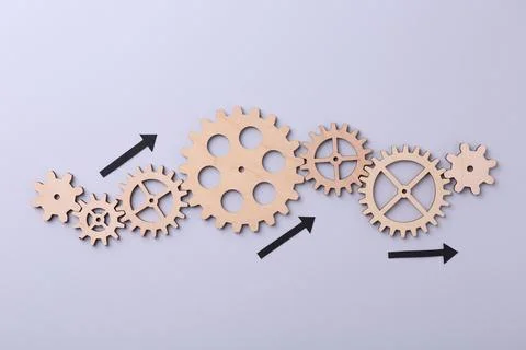 Business process organization and optimization. Scheme with wooden figures .. Stock Photos