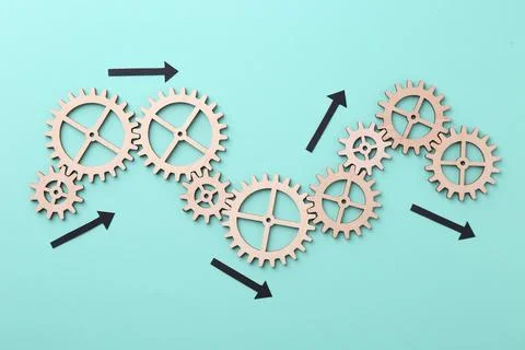 Business process organization and optimization. Scheme with wooden figures .. Stock Photos