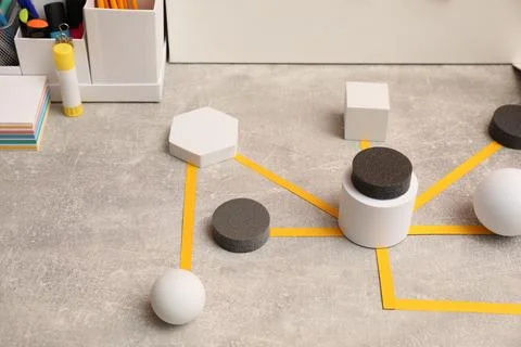 Business process scheme with geometric figures and stationery on light grey.. 스톡 사진