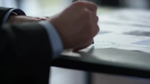 Business Professional Analyzing and Marking Documents Stock Footage 300271601