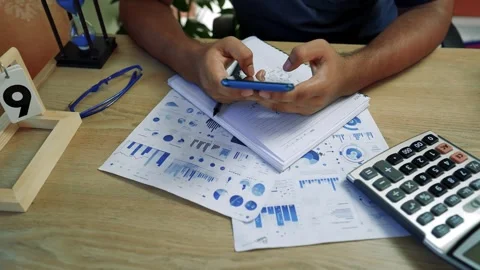 Business Professional Analyzing Data on Smartphone Stock Footage 317736953