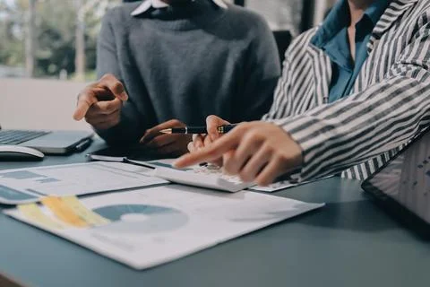 Business professional analyzing financial data on digital tablet dashboard .. Stock Photos