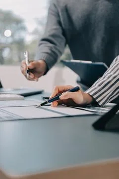Business professional analyzing financial data on digital tablet dashboard .. Stock Photos