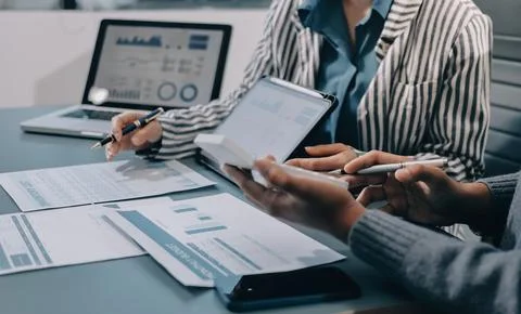 Business professional analyzing financial data on digital tablet dashboard .. Stock Photos