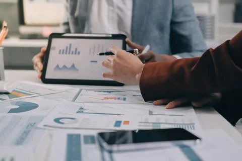 Business professional analyzing financial data on digital tablet dashboard .. Stock Photos
