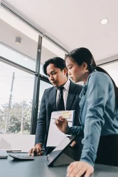 Business professional analyzing financial data on digital tablet dashboard .. Stock Photos