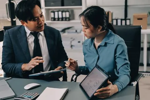 Business professional analyzing financial data on digital tablet dashboard .. Stock Photos