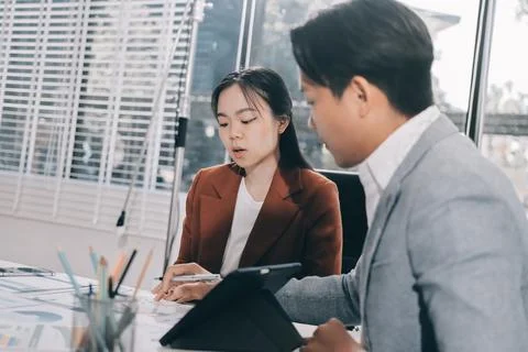 Business professional analyzing financial data on digital tablet dashboard .. Stock Photos