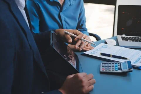 Business professional analyzing financial data on digital tablet dashboard .. Stock Photos