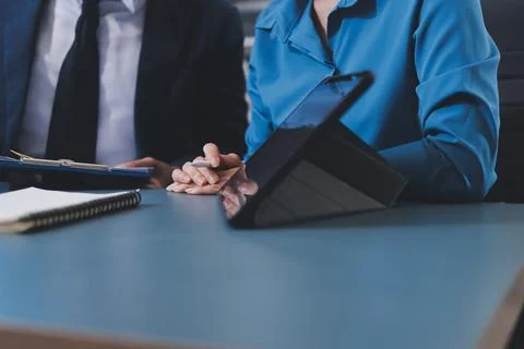 Business professional analyzing financial data on digital tablet dashboard .. Stock Photos